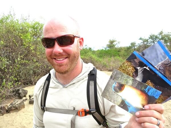 Brian shows off the Galapagos postcards we will hand deliver some day